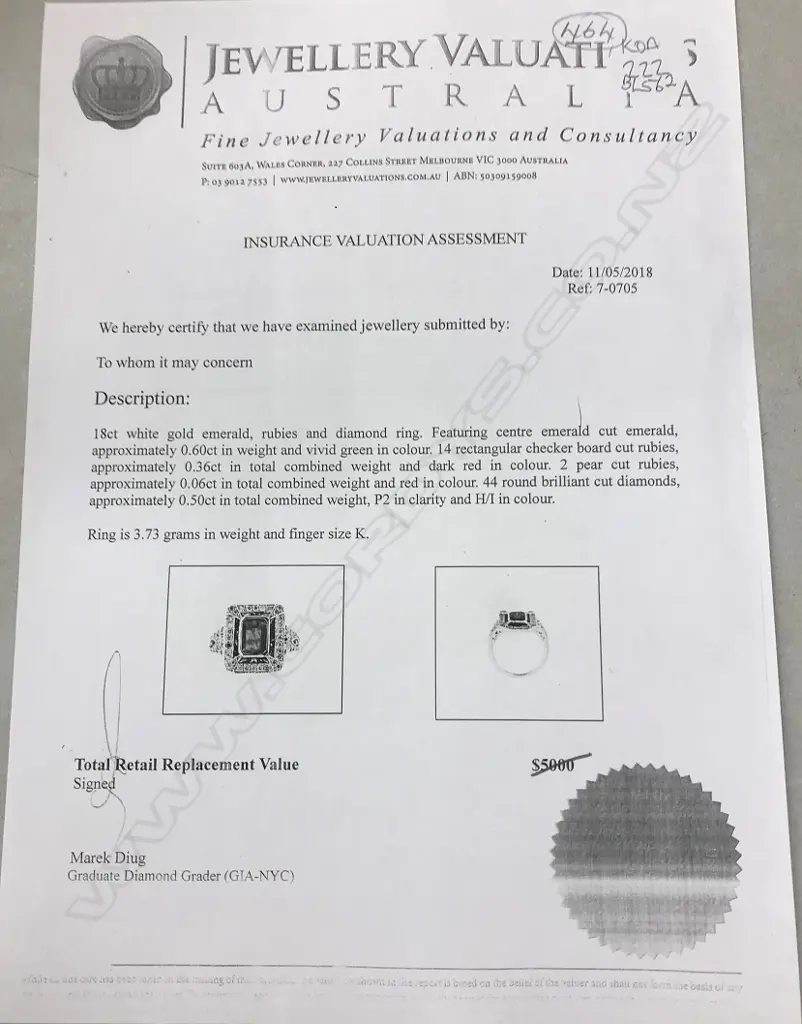 An 18ct white gold emerald ruby and diamond Art Deco style ring Image 1++