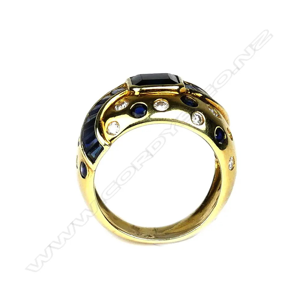 A 14ct gold sapphire and diamond ring Image 1++