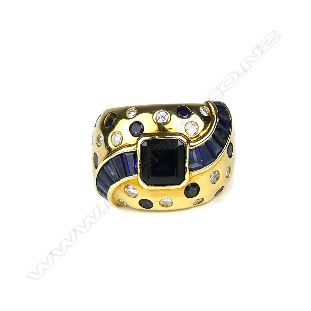 A 14ct gold sapphire and diamond ring Image 1++