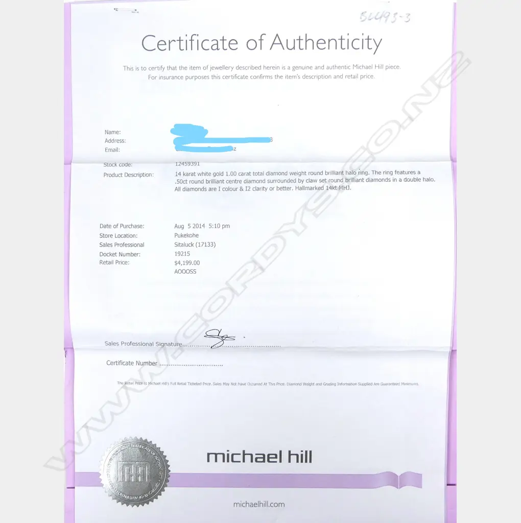 A 14ct. white gold and diamond cluster ring Image 1++