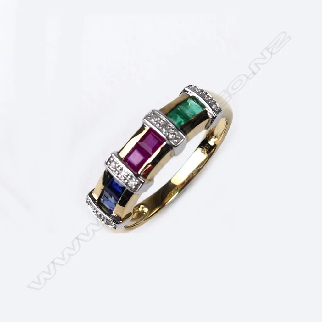 A 9ct gold sapphire ruby emerald and diamond dress ring Image 1++