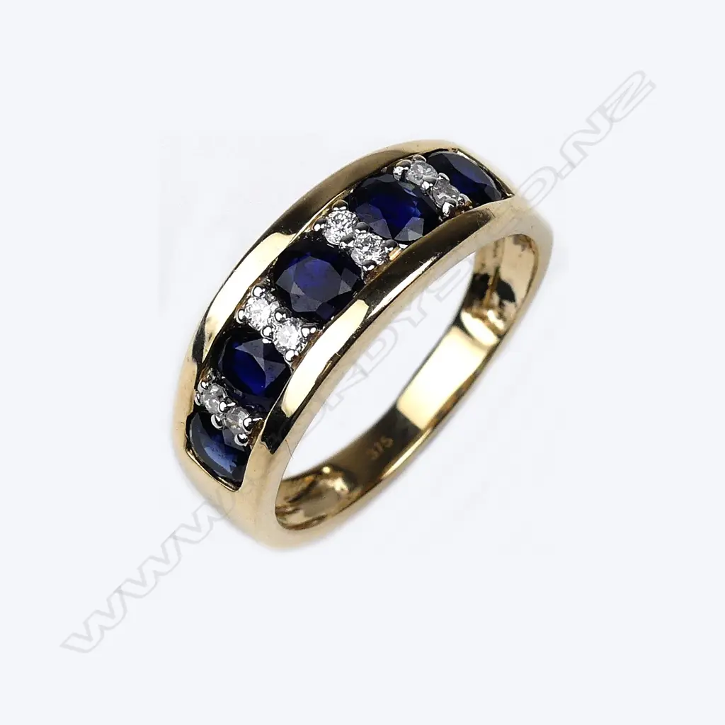 A 9ct gold sapphire and diamond dress ring Image 1++