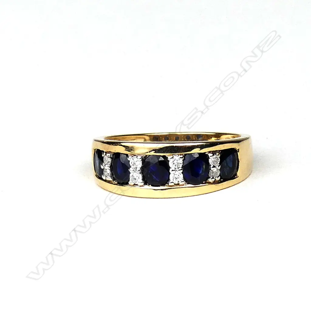 A 9ct gold sapphire and diamond dress ring Image 1++