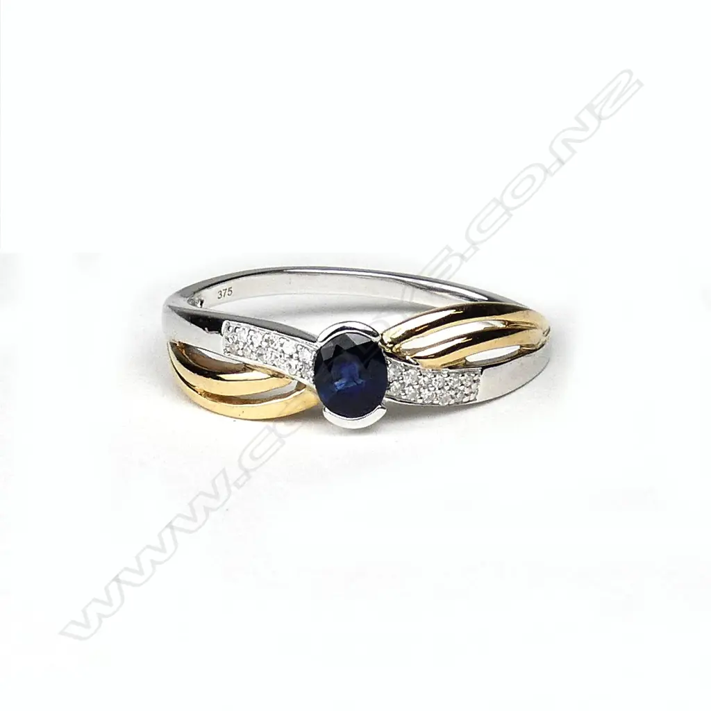 A 9ct gold sapphire and diamond ring Image 1++