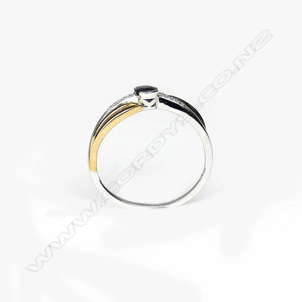 A 9ct gold sapphire and diamond ring Image 1++