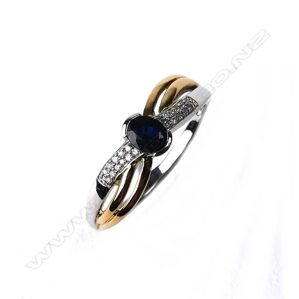 A 9ct gold sapphire and diamond ring Image 1++
