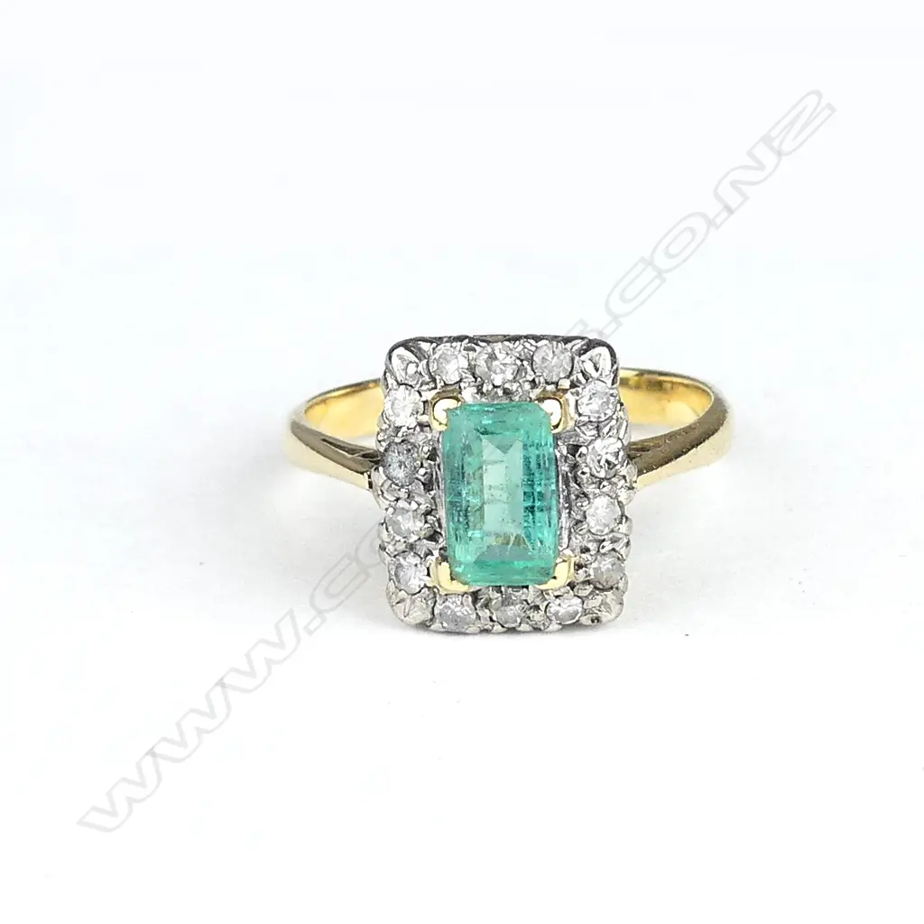 A lady's estate 18ct. yellow gold emerald and diamond ring Image 1++