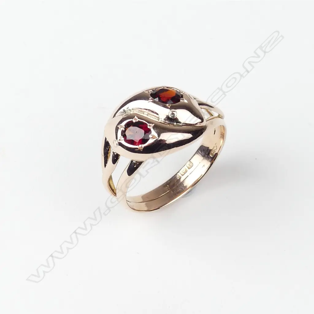 An antique 9ct rose gold snake ring Image 1++