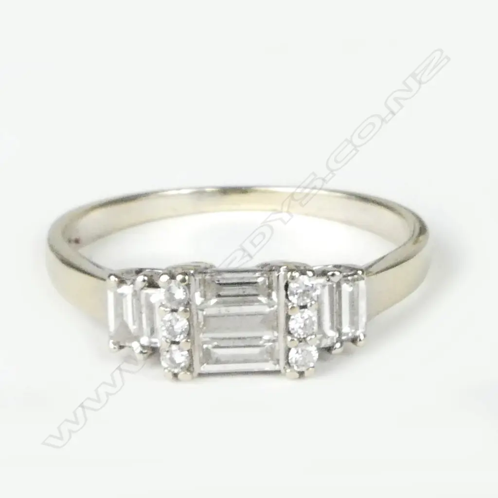 A vintage lady's 18ct. white gold and baguette diamond ring Image 1++