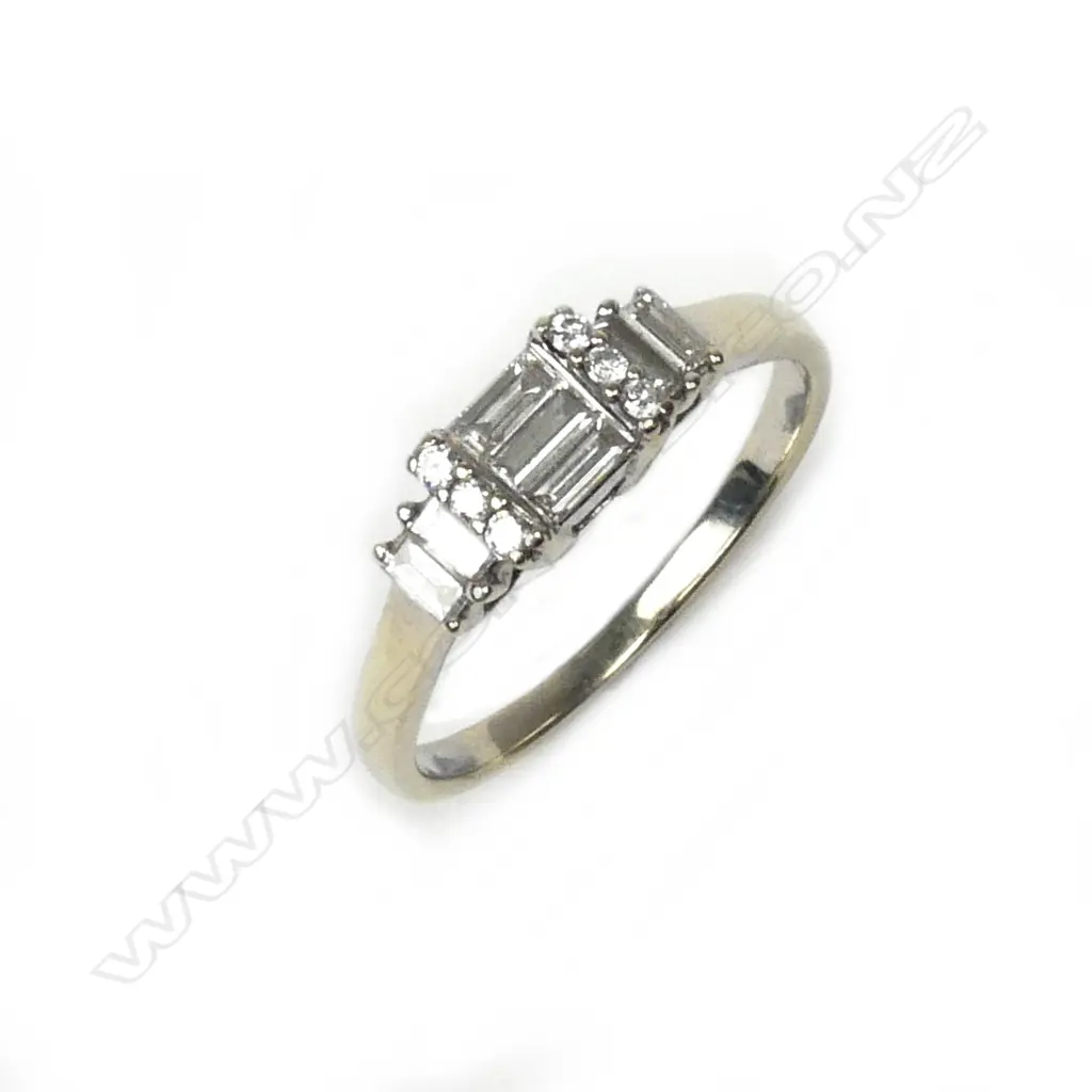 A vintage lady's 18ct. white gold and baguette diamond ring Image 1++