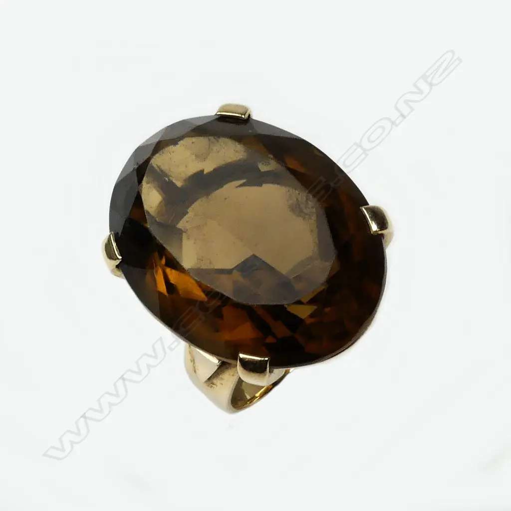 A 9ct. gold and large smoky quartz lady's dress ring Image 1++