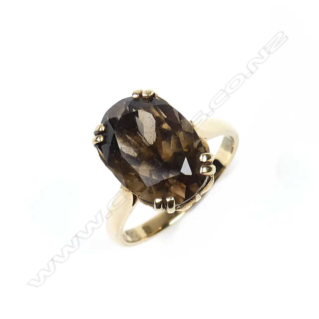 A 9ct gold and smoky quartz ring Image 1++