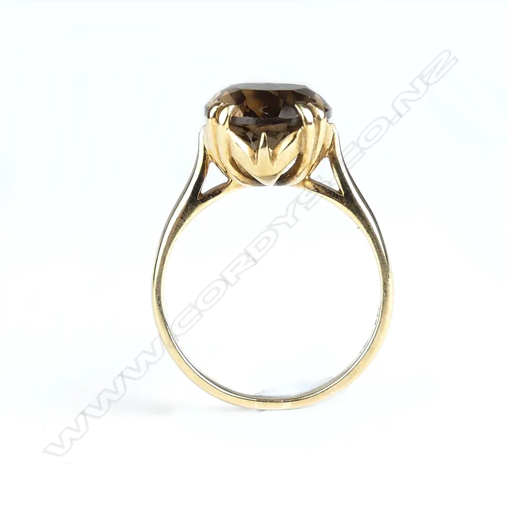 A 9ct gold and smoky quartz ring Image 1++