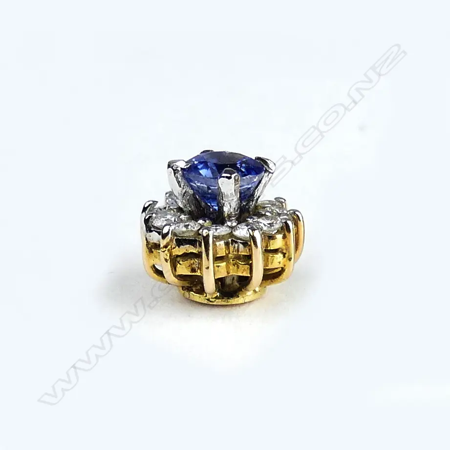 A pair of 10ct gold sapphire and diamond stud earrings Image 1++