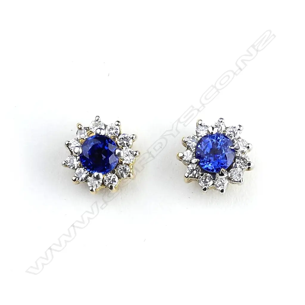 A pair of 10ct gold sapphire and diamond stud earrings Image 1++