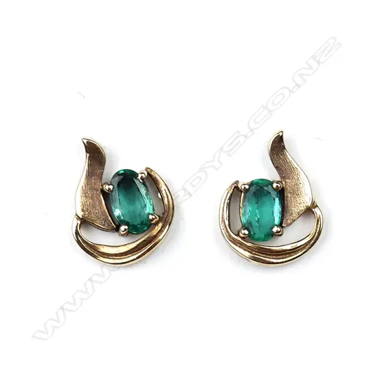A pair of 9ct gold and emerald stud earrings