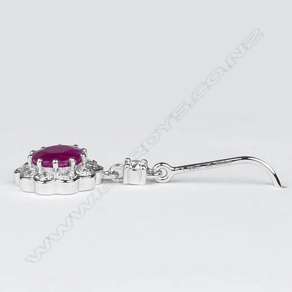 A pair of 14ct white gold ruby and diamond drop earrings Image 1++