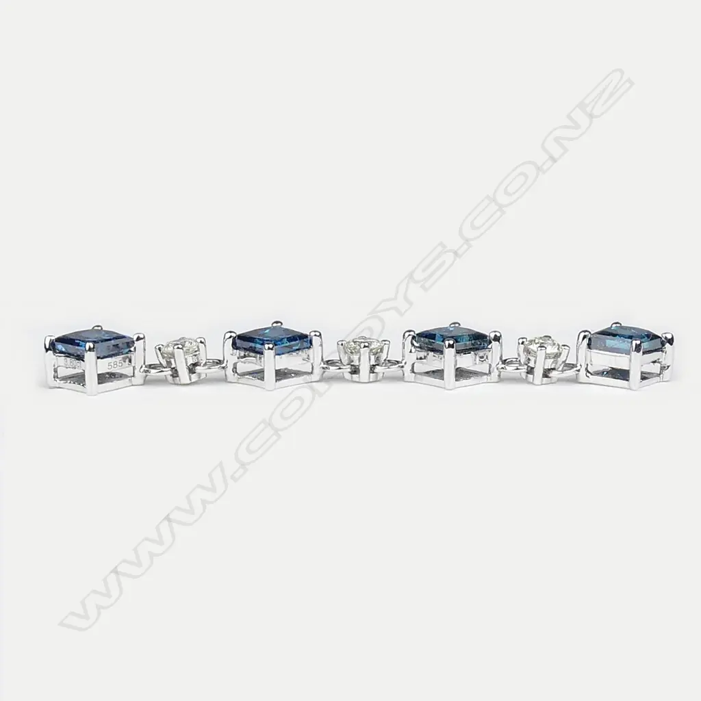 A pair of 14ct white gold and diamond drop earrings Image 1++