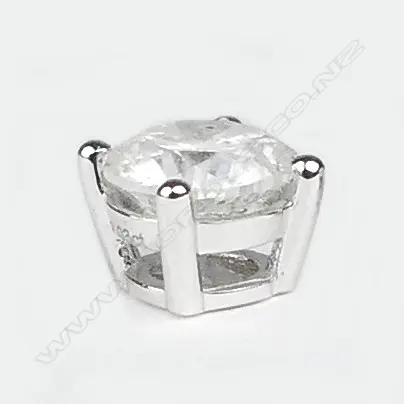A pair of 14ct white gold and diamond stud earrings Image 1++