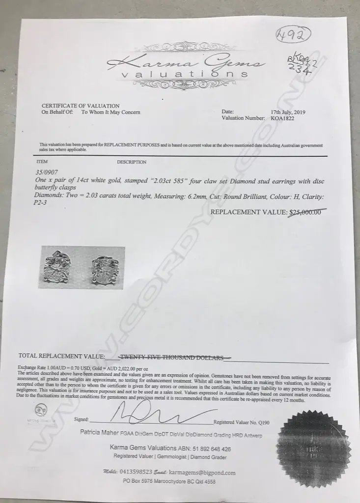 A pair of 14ct white gold and diamond stud earrings Image 1++