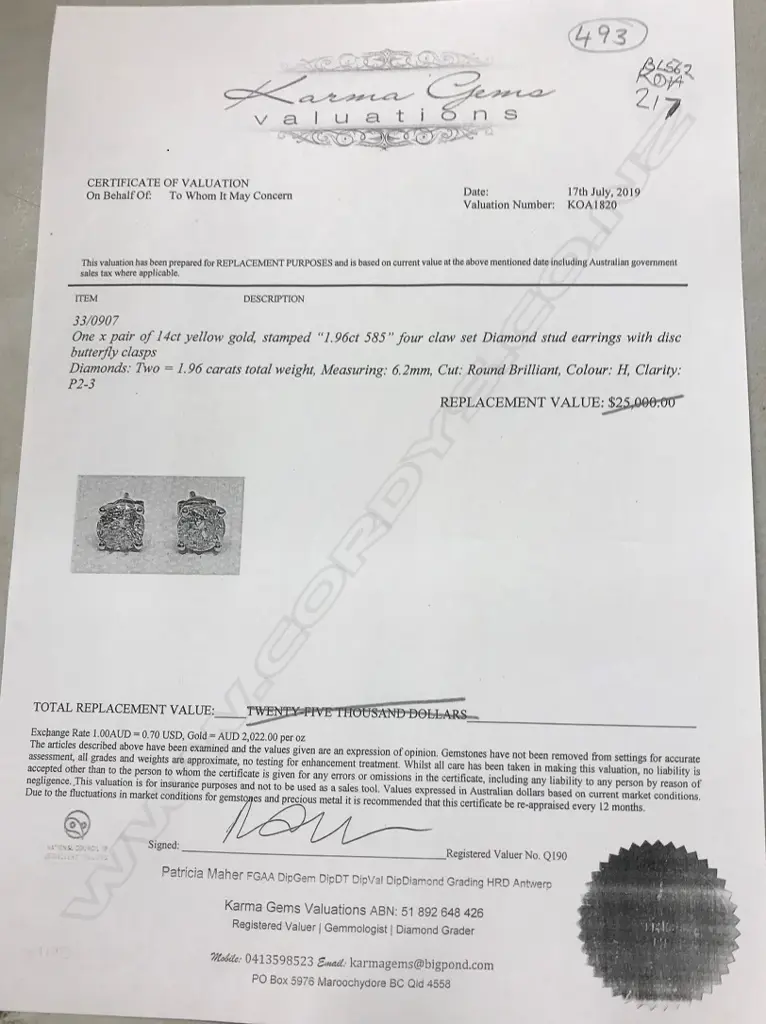 A pair of 14ct gold and diamond stud earrings Image 1++