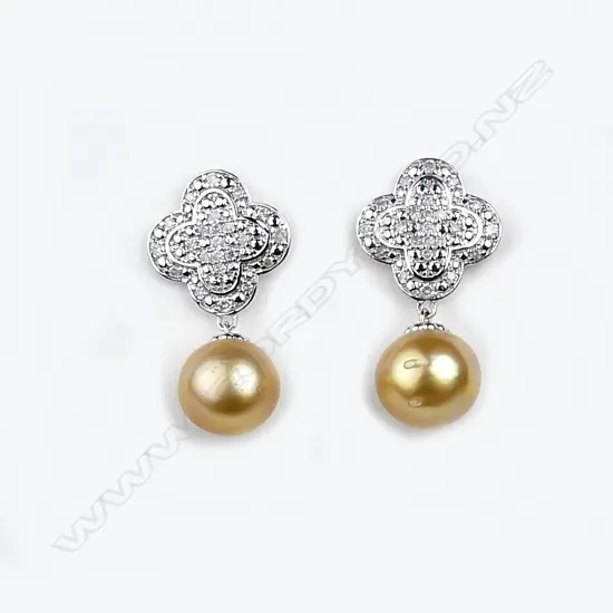 A pair of 14ct white gold pearl and diamond drop earrings