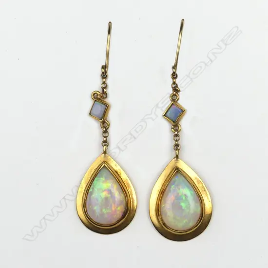 A pair of vintage 18ct. yellow gold and opal pendant drop earrings