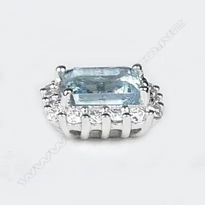 A pair of 14ct white gold aquamarine and diamond stud earrings Image 1++