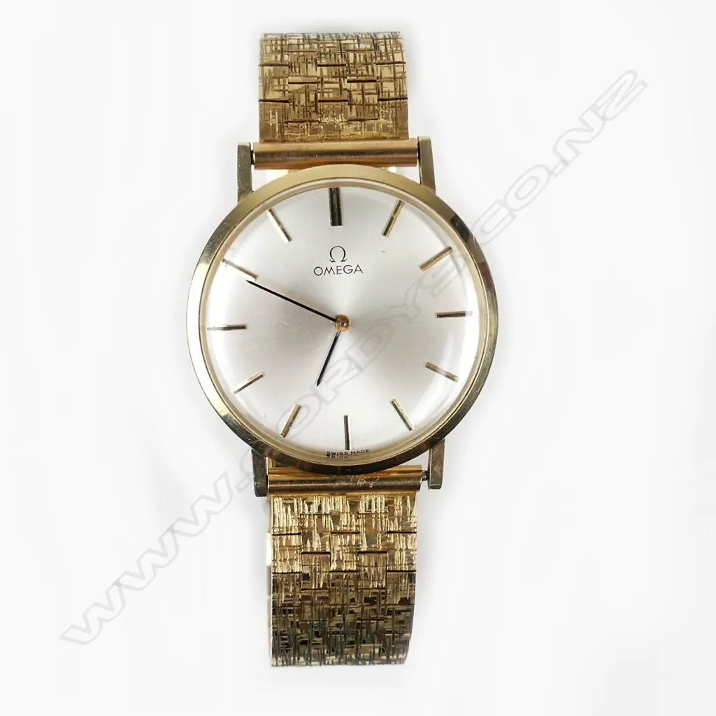 An Omega 14ct gold ultra-slim wristwatch Image 1++