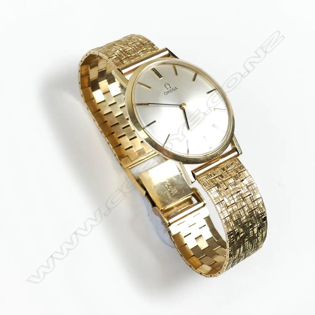 An Omega 14ct gold ultra-slim wristwatch Image 1++