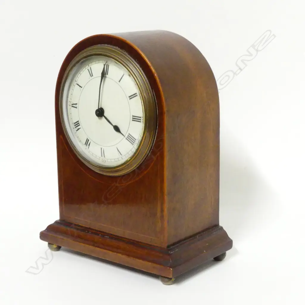 An Edwardian mahogany cased mantel clock Image 1++