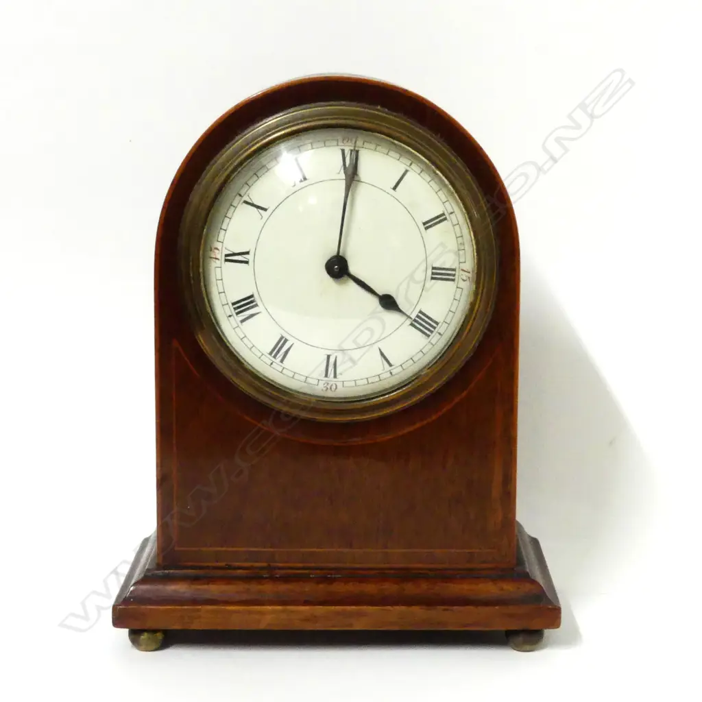 An Edwardian mahogany cased mantel clock Image 1++