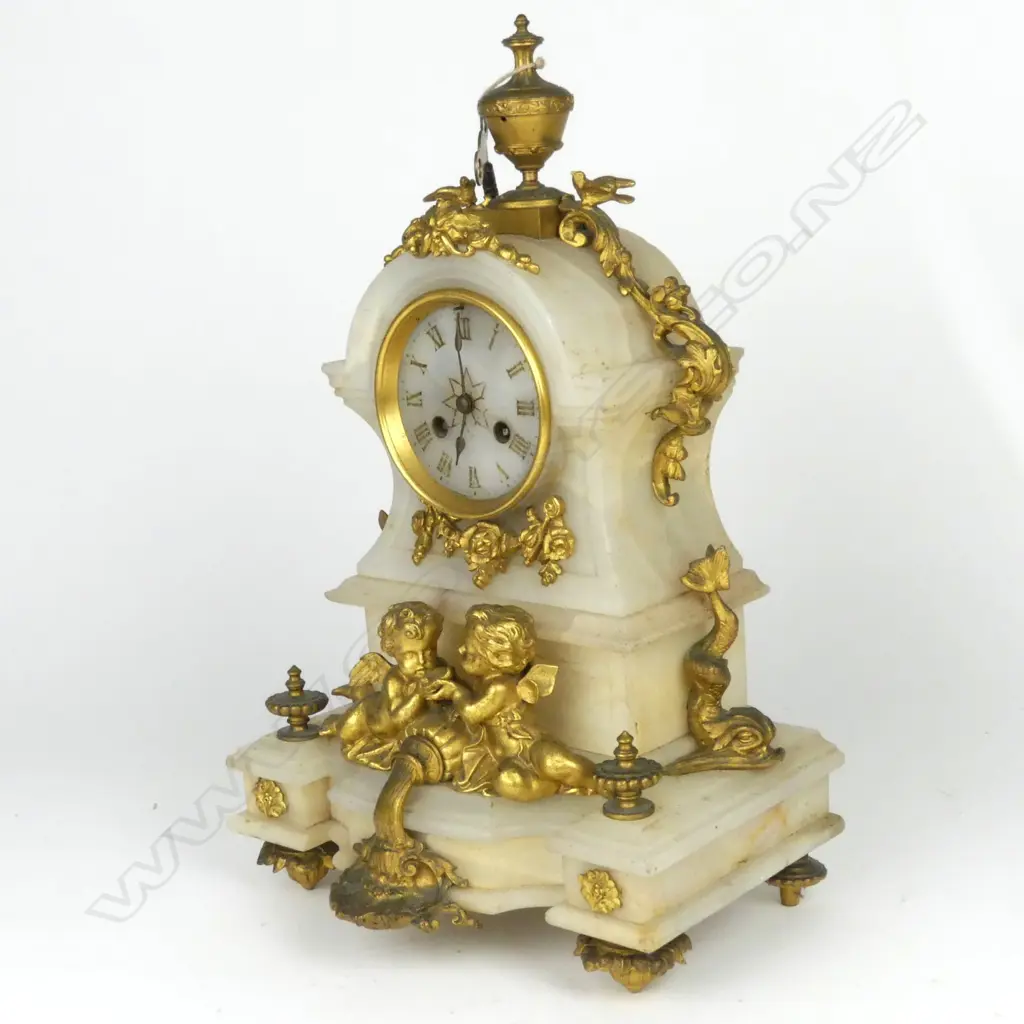A French alabaster and ormolu mantel clock Image 1++