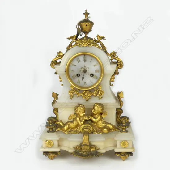 A French alabaster and ormolu mantel clock