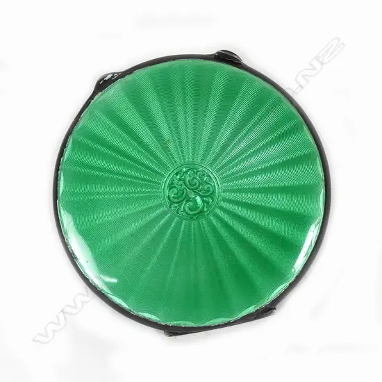 A silver and enamel powder compact