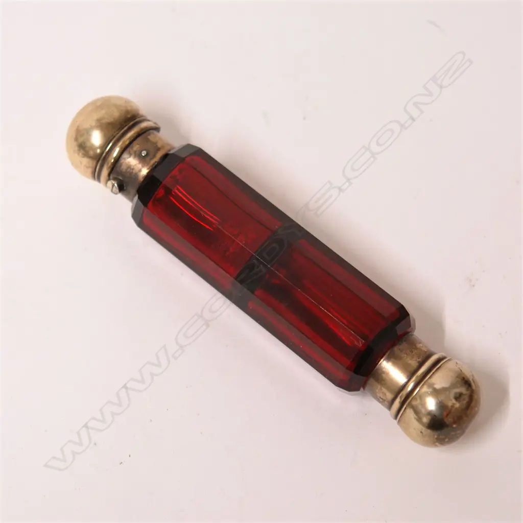 A Victorian cranberry glass and gilded silver plate double-ended scent bottle Image 1++