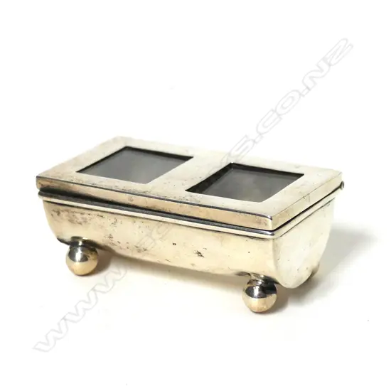 An Edwardian silver double stamp holder