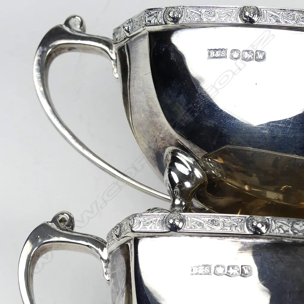 An Art Deco silver four piece tea set Image 1++