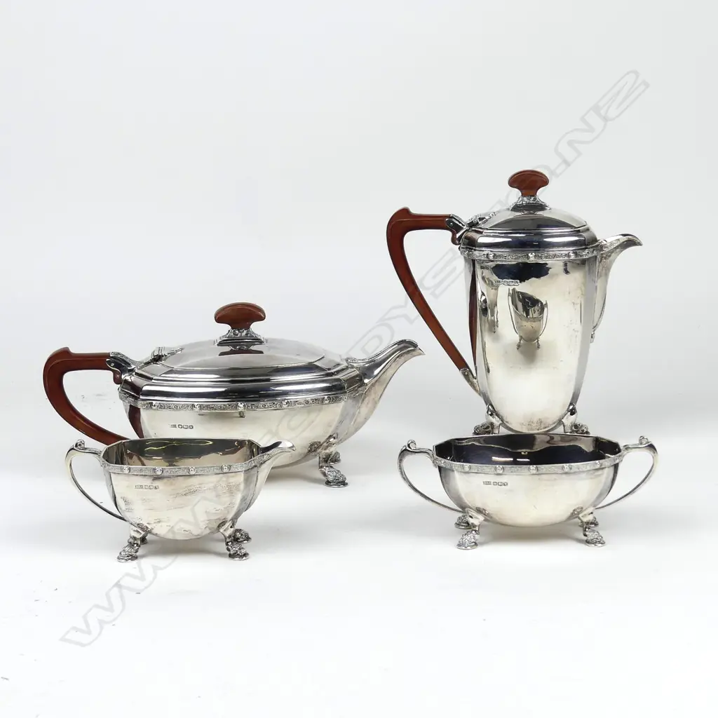 An Art Deco silver four piece tea set Image 1++