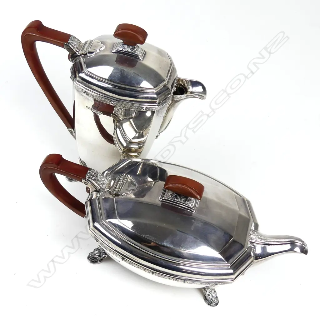 An Art Deco silver four piece tea set Image 1++
