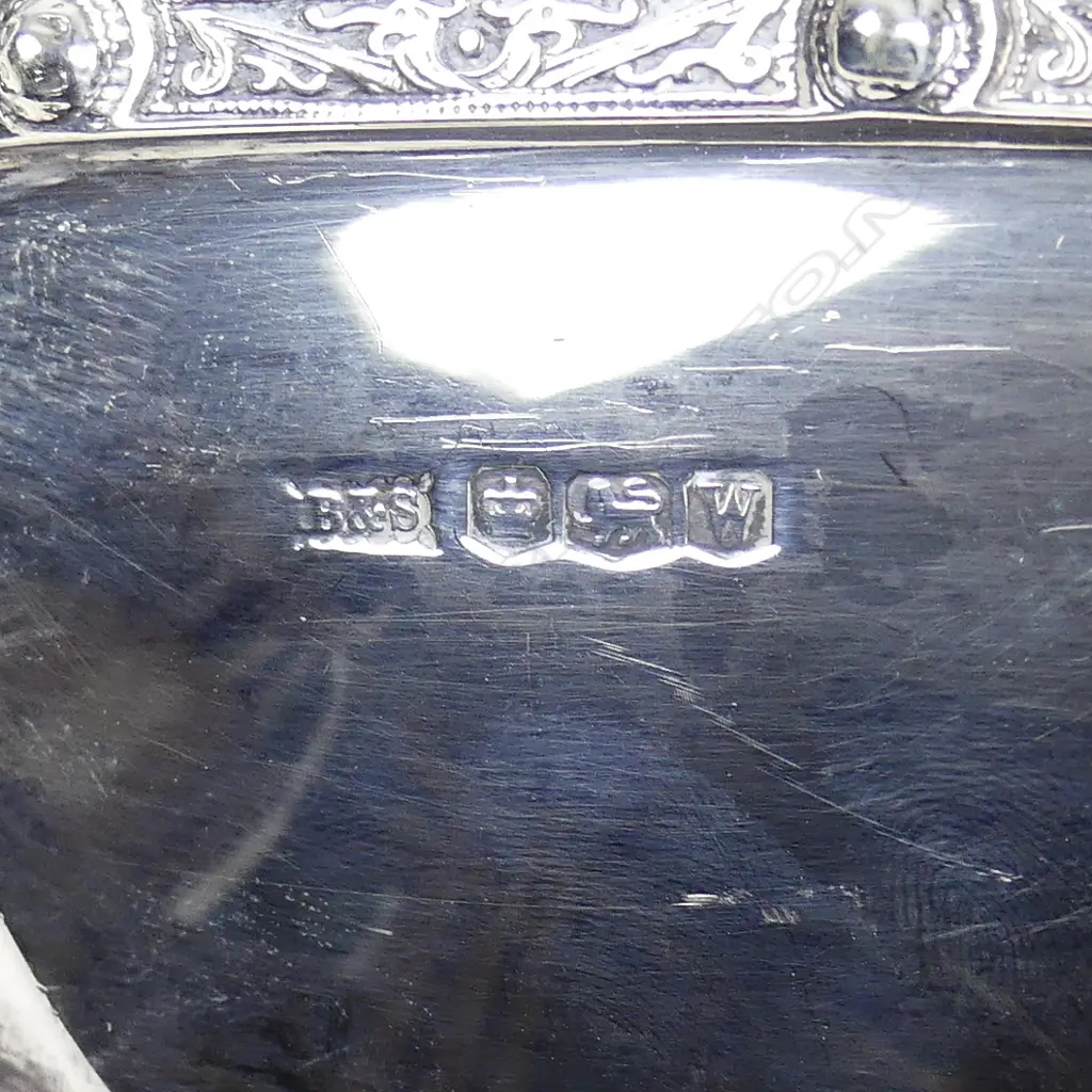 An Art Deco silver four piece tea set Image 1++