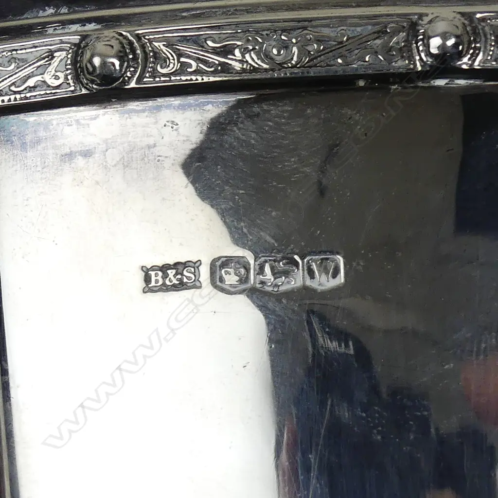 An Art Deco silver four piece tea set Image 1++