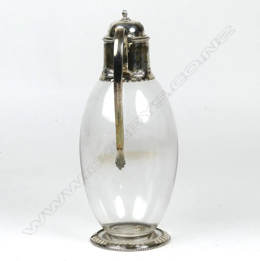 A Victorian silver and glass claret jug Image 1++