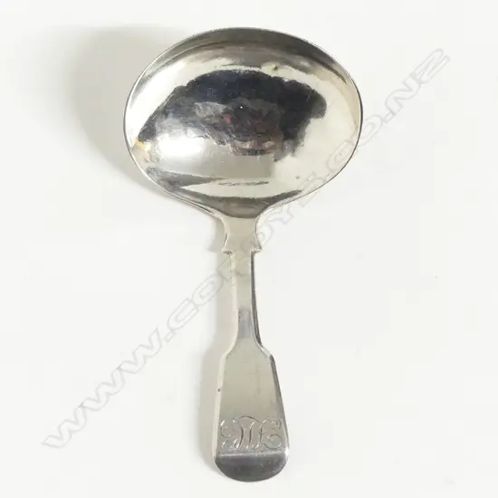 A George III silver fiddle pattern caddy spoon