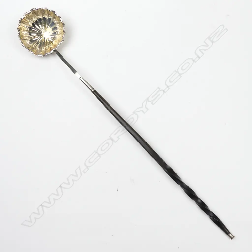 A George III silver toddy ladle Image 1++
