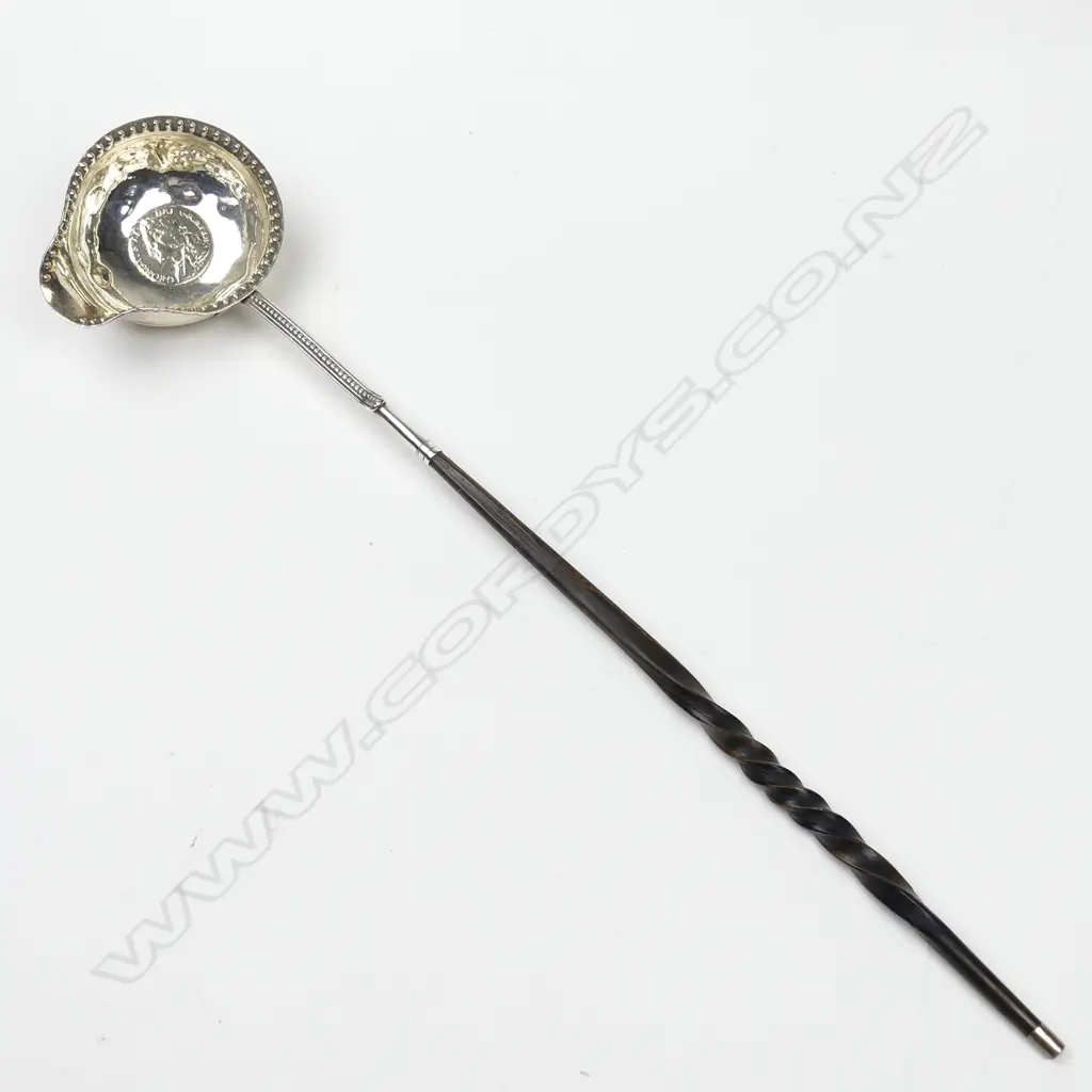 A George II silver toddy ladle Image 1++