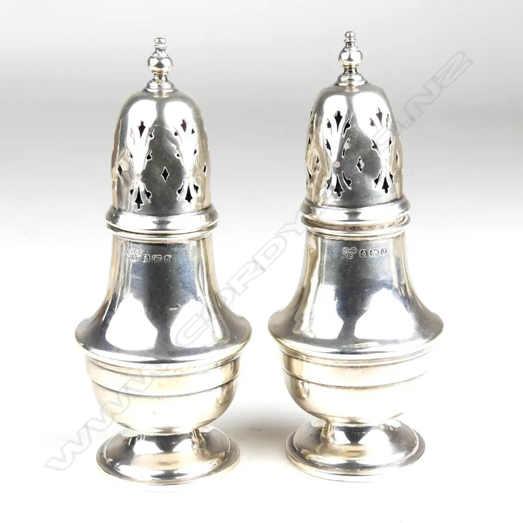 A pair of silver sugar casters Image 1++