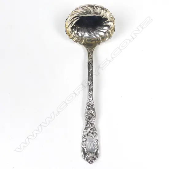 A Tiffany & Co Chrysanthemum pattern silver sauce ladle