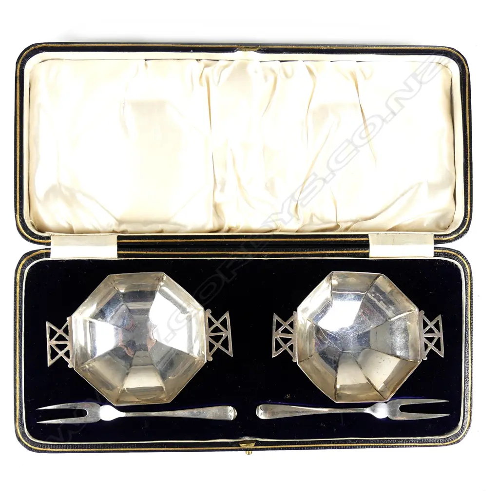 A pair of small silver octagonal petit fours dishes and forks Image 1++