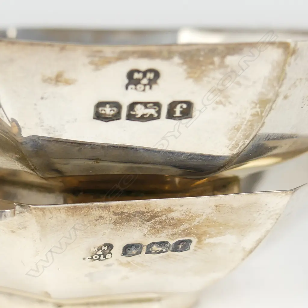 A pair of small silver octagonal petit fours dishes and forks Image 1++